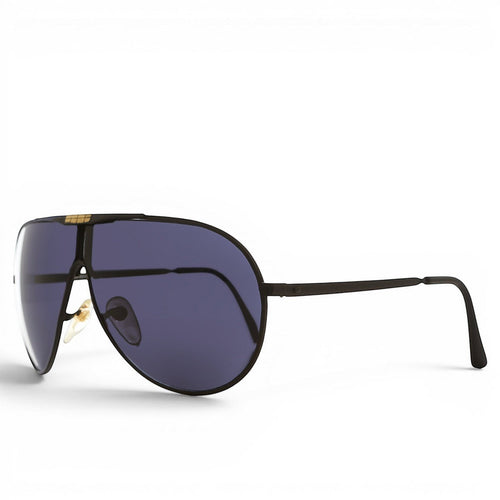 80s Decker aviator sunglasses with black frame, brass accent, and dark lenses. UV protection.